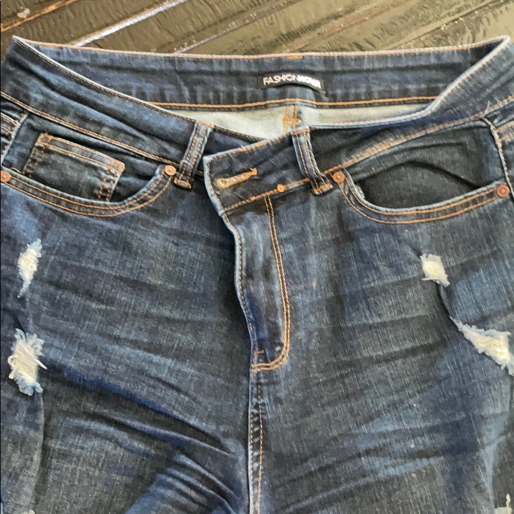 FashionNova skinny distressed jeans
